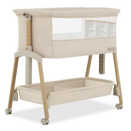 Experience the perfect blend of comfort and convenience with Evolur Lullaby Portable Bassinet With Wheels! This foldable and portable bassinet is your ideal companion for on-the-go parenting. Featuring convenient wheels, this portable bassinet allows you to effortlessly move your baby from room to room. Boasting an extremely sturdy frame, the Lullaby ensures a secure environment for your baby. The seven adjustable height positions, complemented by a second lock, provide versatility for your conv Baby Basinets, Room Sharing, Baby Tent, Nursery Bassinet, Portable Bassinet, Baby Registry Items, 3 Month Baby, Baby Bassinet, Baby Necessities