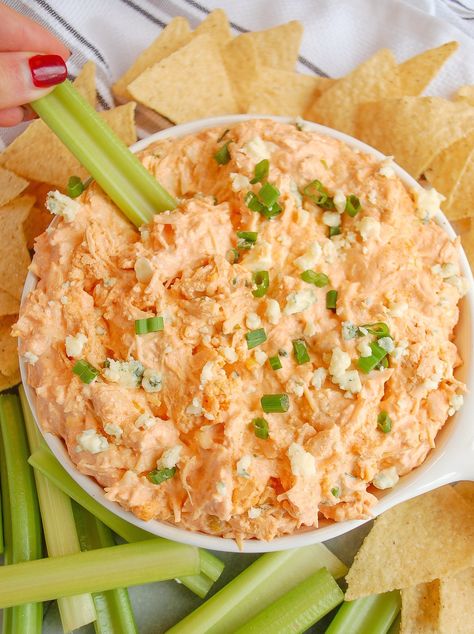 Spicy, creamy, and delicious healthier buffalo chicken dip made with lighter ingredients and will leave you feeling good after indulging in the best party appetizer! Made with lightened up dairy and buffalo sauce, this makes for the best healthy game day snack! #healthybuffalochickendip #buffalochickendip #healthysuperbowl #healthyappetizer #glutenfree #gamedaysnacks #gamedayfood #buffalochicken #lightenedup #appetizers | erinliveswhole.com Spicy Chicken Dip, Erin Lives Whole, Healthy Buffalo Chicken Dip, Appetizers Healthy, Healthy Superbowl, Healthy Superbowl Snacks, Spicy Appetizers, Healthy Buffalo Chicken, Healthy Dips