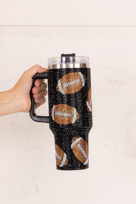 This fully rhinestone 40 oz tumbler combines style and convenience . The rhinestone design adds a touch of glamour while the large capacity holds enough liquid for all your gameday hydration. Enjoy cold drinks for up to 24 hours and hot drinks for up to 6 hours. Perfect for any beverage on the go. 40oz Cup Includes Straw and straw cleaner Football Tumbler, Rhinestone Tumbler, Queen Of Sparkles, Rhinestone Cups, Glitter Tumbler Cups, Straw Cleaner, 40 Oz Tumbler, Rhinestone Designs, Hot Drinks