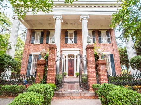 206 N Madison Ave, Eatonton, GA 31024 | Zillow Brick Greek Revival Exterior, House With 2 Car Garage, Greek Revival Exterior, Porch With Columns, Cool Mansions, Paved Driveway, Front Porch Columns, Historic Homes For Sale, Historical Homes