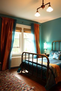 teal copper bedroom | Bedroom done in teal and copper a mix of Bohemian Chic and turn of the ... Teal Wall Bedroom, Teal And Copper Bedroom, Orange And Teal Bedroom, Dark Teal Bedroom Ideas, Dark Teal Bedroom, Fishing Cottage, Teal Bedroom Ideas, Teal Bedroom Decor, Teal And Copper