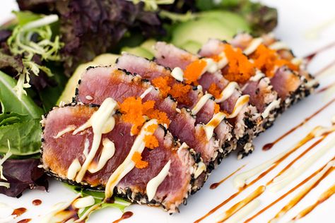 Pan-seared Sesame-crusted Tuna; serve with creamy slices of Avocado, a drizzle of Wasabi Mayonnaise and Anago sauce(a soy sauce, brown sugar and rice wine vinegar sauce).  Recipes for all here.  | use real butter Bonefish Grill Recipes, Seared Tuna Recipe, Sesame Crusted Tuna, Ahi Tuna Recipe, Tuna Loin, Seared Ahi Tuna, Tuna Sashimi, Bonefish Grill, Grilled Tuna