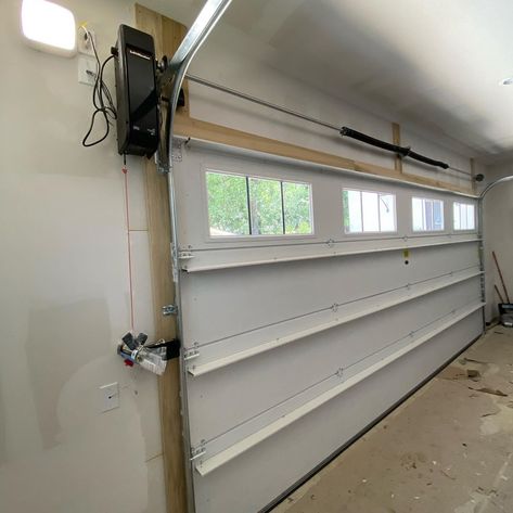 Matt Risinger on Instagram: “Side mount garage door motor!  So clean not having that center bar. Has a battery backup too in case power goes out. @liftmaster app…” Folding Garage Doors, Garage Door Lights, Side Hinged Garage Doors, Retractable Glass Doors, Sliding Garage Doors, Carriage Garage Doors, Garage Door Hinges, Automatic Garage Door, Wooden Garage Doors