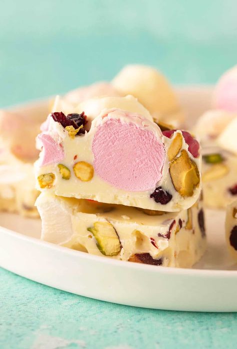 Celebrate Christmas with my 6 ingredient White Chocolate Rocky Road. This easy no bake slice is filled to the brim with coconut, marshmallows and pistachios. Recipe from sweetestmenu.com #rockyroad #christmasbaking #nobake No Bake Slice, White Chocolate Rocky Road, No Bake Slices, Rocky Road Recipe, Chocolate Yule Log, Coconut Jam, Salted Caramel Fudge, Chocolate Fan, Caramel Fudge