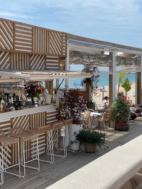 Beach cafe, shoreline, beach, patterns, wood, nature, plants, aesthetic, beige, white, chairs, water, marine, sea Bloxburg Beach Restaurant, Beach Coffee Bar, Seaside Cafe Aesthetic, Beach Cafe Design, Beach Cafe Aesthetic, Beach Restaurant Aesthetic, Beach Bar Aesthetic, Coffee Shop Beach, Beach Coffee Shop