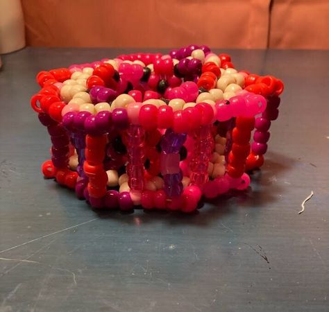 Pink, red & tan carousel cuff, and purple, pink, & black carousel cuff. Both over 2 inches in height, 1.5 inches thick, and fits about 6 inch or smaller wrist. Kandi Cuff, Rose Rouge, Ball Pit, Carousel, Pink Red, Pink Black, Cuff Bracelet, Violet, Jewelry Bracelets