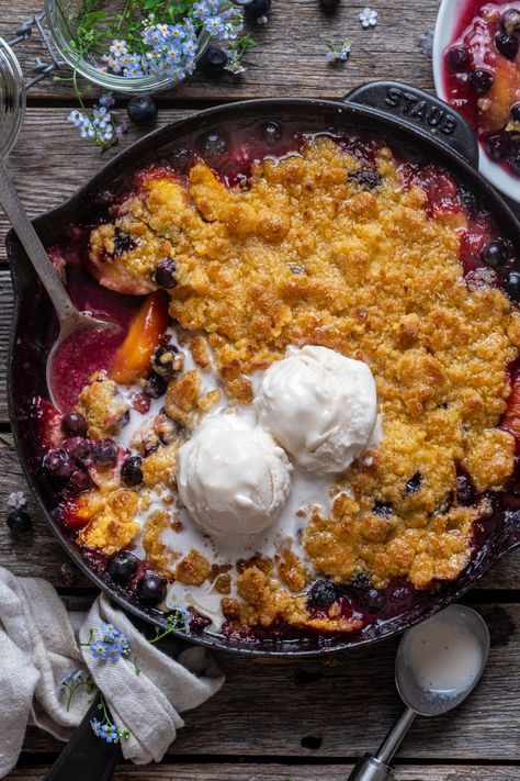 Blueberry Peach Cornbread Crumble Crunchy Cornbread, Peach Cornbread, Skillet Dessert, Blueberry Cornbread, Buttery Cornbread, Frozen Peaches, Frozen Summer, Peach Crumble, Blueberry Desserts