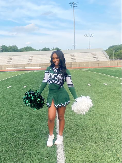 Cheer Pictures Black, Green And White Cheerleading Uniform, Cheerleading Outfits High School, Green Cheer Uniforms, Black Cheerleader Aesthetic, Cheerleading Outfits Aesthetic, Cheer Uniform High School, High School Cheer Uniforms, Pompom Girl