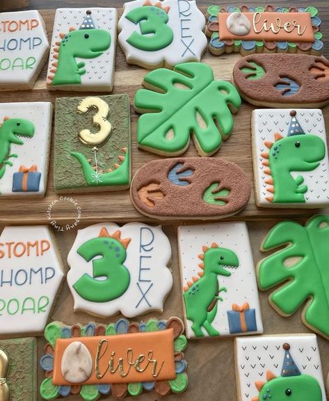 Tiny Kitchen Cookie Company on Instagram: "This theme was so fun! Happy Birthday Oliver!! Dino prints cookies inspired by @busybbakehouse . . . #dinosaurcookies #3rexcookies #3rexbirthday #3rdbirthdaycookies #kidspartyideas #kidspartyinspo #kidspartyfavors #trexcookies #cookies #birthdaycookies #decoratedcookies #decoratedsugarcookies #sugarcookies #customcookies #cookiesofinstagram #massachusetts #boston #southshore #southshorema #southshorefoodies #weymouthma #sugarcookiemarketing" Three Rex Birthday Cookies, 3 Rex Cookies, Three Rex Cookies, 2023 Cakes, Dinosaur Cakes, Fun Happy Birthday, Dinosaur Birthday Theme, Massachusetts Boston, Dinosaur Cookies