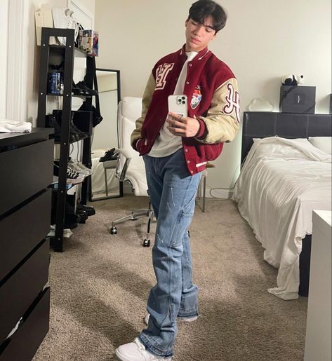 Red Letterman Jacket Outfit Men, Red Jeans Outfit Men, Brown Varsity Jacket Outfit Men, 90s Letterman Jacket Outfit, University Jacket Outfit, Brown Varsity Jacket Outfit, University Outfit Men, Brown And Red Outfit, Varsity Jacket Outfit Mens