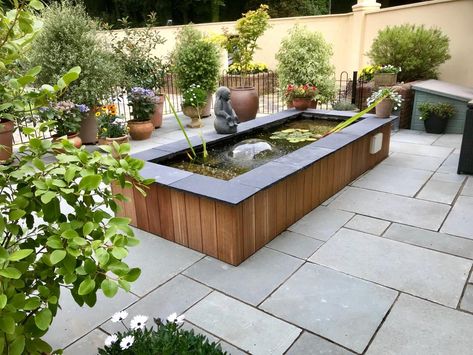 Raised Garden Pond Ideas, Rectangle Pond, Raised Pond Ideas, Raised Ponds, Pool Tile Ideas, Koi Pond Backyard, Mediterranean Mosaic, Fish Ponds Backyard, Limestone Patio