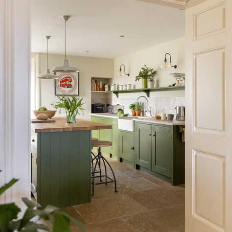 This country house is as beautiful as its stunning surroundings | Ideal Home Green Kitchen Diner, Green Cabinet Kitchen, Tops Tiles, Green Cabinet, Restful Bedrooms, Neutral Dining Room, Welcoming Home, Country Retreat, Kitchen Island With Seating