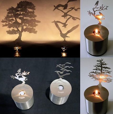 little oil candle casts an enchanting shadow from a tiny, stainless steel tree. As the flame flickers, the shadow of the tree moves like a light breeze is rustling its branches. A unique twist on a normal candle. Shadow Candle, Unusual Candles, Candle Art, Shadow Art, Oil Candles, Cool Inventions, Diy Wall Decor, Diy Wall, Light Art