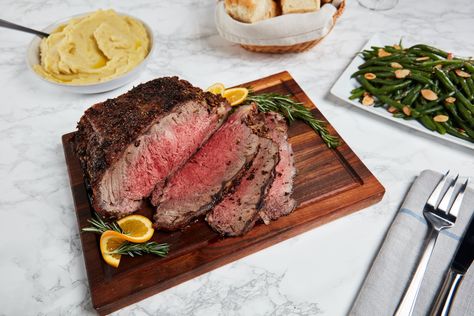 Impress your guests with this flavor-packed holiday strip loin roast that is easy to prepare with Natural Angus Beef and only 6 other simple ingredients. Best Roast Beef For Slicing, Beef Strip Loin Roast, Beef Large End Rib Roast, New York Strip Loin Roast, Reverse Sear Beef Tenderloin, Beef Strips, Rosemary Leaves, Angus Beef, Fresh Rosemary