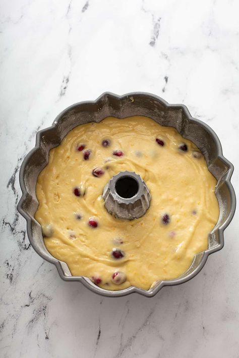 Cranberry Orange Bundt Cake is an easy and beautiful cake to feed the whole family during the holiday season. This tart and sweet bundt cake is topped with an orange glaze for the perfect finish. Cranberry Orange Bundt Cake Recipe, Orange Bundt Cake Recipe, Cranberry Orange Bundt Cake, Christmas Bundt Cake, Cranberry Christmas Cake, Cranberry Orange Cake, Orange Bundt Cake, Cranberry Orange Bread, Cranberry Cake