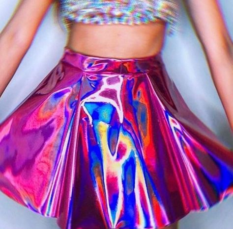 Skater skirt made from pink PVC! This skirt is 14.5 inches long and is holographic! Has zipper in the back. Size chart-  XS-25 inch waist S- -28 inch waist M-31 inch waist L- 34.5 inch waist XL- 38 inch waist 2XL- 42 inch waist 3XL- 48 inch waist Maid Fancy Dress, Pink Pvc, Pvc Skirt, Sparkly Skirt, Pink Holographic, Sculptural Fashion, Vinyl Clothing, Womens Skirts, Shiny Clothes