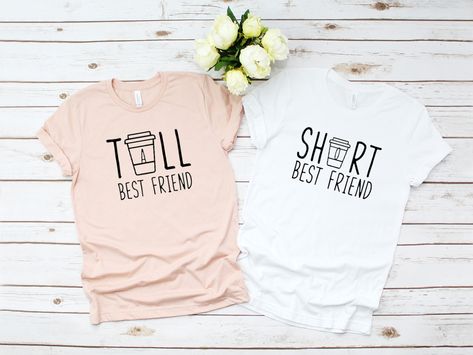 Best Friends Tall Best Friend, Short Best Friend - Unisex Short Sleeve T-Shirt We use Bella + Canvas 3001 premium t-shirts which have a soft and light feel, It's very comfy and with it's unisex sizing it's perfect for both men and women. Everyone Needs A Tall And Short Best Friend! Perfect Gift For Your Best Friend!  BRAND & MATERIAL: Bella + Canvas - Unisex Short Sleeve Jersey Tee - 3001 - 4.2 oz., 100% airlume combed and ringspun cotton, 32 singles - Athletic Heather and Black Heather are 90/1 Tall And Short Best Friend, Tall And Short, Friend Shirts, Bff Matching, Combination Fashion, Best Friend Shirts, Matching Couple Shirts, Friends Shirt, Women's Shirts