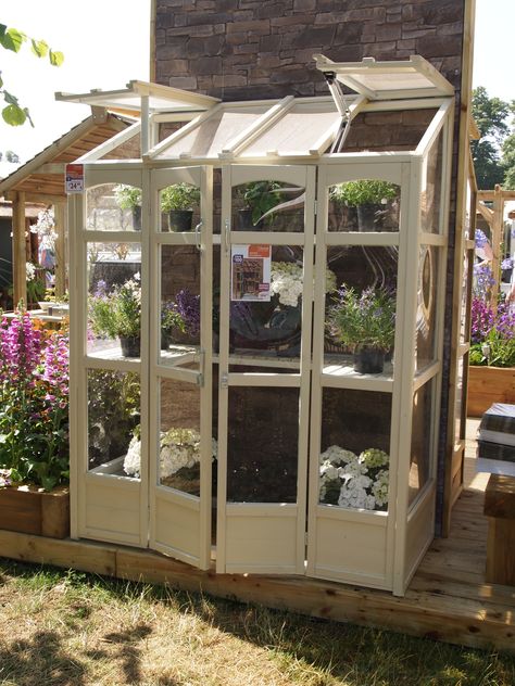 Forest Garden Tall Wall Greenhouse painted. At Hampton Court Flower Show 2013. Tall Wall Greenhouse, Wall Greenhouse, Homemade Greenhouse, Cheap Greenhouse, Hampton Court Flower Show, Best Greenhouse, Lean To Greenhouse, Outdoor Greenhouse, Greenhouse Shed