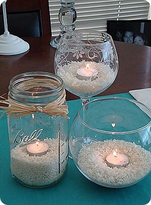 clear glasses/jars, white rice, and tea lights--easy summer centerpiece (I also think it would look cool with dyed rice as well~Julia) Summer Centerpieces, Dining Room Centerpiece, Jar Centerpieces, Summer Candles, Mason Jar Centerpieces, Clear Glasses, Buy Home, Mason Jar Crafts, Jar Crafts