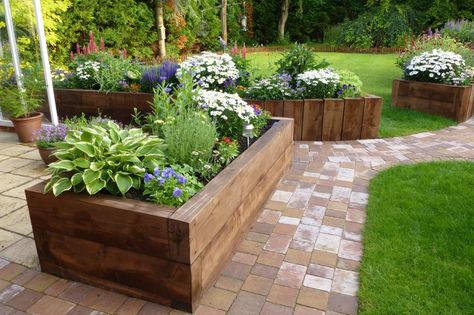 raised beds from new eco pine railway sleepers Sleepers Garden, Railway Sleepers Garden, Garden Raised Beds, Sleepers In Garden, Garden Boxes Raised, Raised Flower Beds, Railway Sleepers, Back Garden Design, Wooden Planter