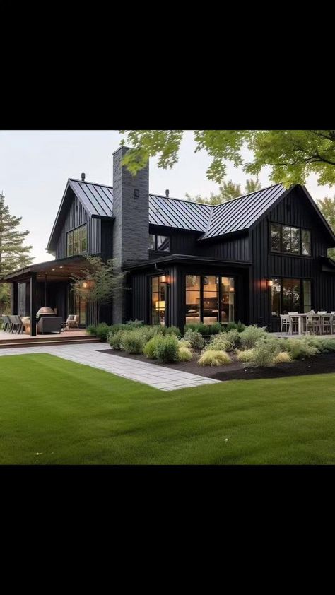 Posted @withregram • @alpine_manor Step into the captivating embrace of a stunning black designed modern farmhouse, where sleek sophistication meets cozy serenity 🏠 The warm and inviting living room beckons you to sink into sumptuous cushions and lose yourself in the pages of a cherished book 🛋️ In the bright and airy kitchen, the black design is artfully integrated, creating a bold and captivating space that's perfect for whipping up culinary masterpieces or simply basking in the warmth of mo Modern Black Farmhouse Interior, Modern Dark Farmhouse Exterior, Modern Black House Design, One Story Black House, All Black Farmhouse, Modern Gothic Farmhouse, Black Modern Farmhouse Exterior, All Black Home, Modern Black House Exterior