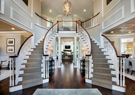 DOUBLE STAIRS FOYER | Dramatic Two-story foyer with elegant curved staircases Foyer Staircase, Double Staircase, Foyer Decorating, Coastal Living Rooms, Foyer Design, Curved Staircase, Grand Staircase, House Goals, Dream House Plans