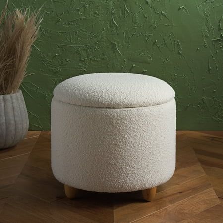 Shop Safavieh at Walmart. Save Money. Live Better. SAFAVIEH Couture Mariabella Modern Boucle Ottoman with Storage, Ivory Bring style and convenience to your home with our Mariabella storage ottoman. Expertly tailored, our ottoman shows off an elegant drum-shaped silhouette to harmonize with any style or decor. It is upholstered in boucle and elevated upon oak legs to deliver rich and warm textures to your home. Underneath its sleek silhouette is ample storage to hide away your essentials and knick-knacks. The ottoman can keep your space clutter-free, and serve as a footrest or extra seat. Color: Off-White. Guest Bedroom And Office, Beige Ottoman, Boucle Ottoman, Ottoman With Storage, Spindle Dining Chair, Foot Rest Ottoman, Round Storage Ottoman, Cane Dining Chair, Black Ottoman