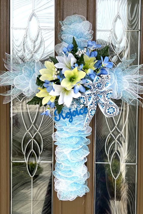 Hello everyone and Welcome! In today's crafting adventure I will show you how to make a deco mesh Cross wreath with flowers. This Easter wreath is done in beautiful blues with accents of white and yellow, a perfect color scheme for a Spring DIY. The Dollar Tree Cross wreath form is used for the base along with my no fray folded ruffle method. Let's get started with this deco mesh Cross Wreath tutorial! Diy Wire Cross Wreath Frame, Deco Mesh Cross Wreath Tutorial, Dollar Tree Wire Cross Wreath Ideas, How To Make A Cross Wreath, Mesh Cross Wreath Diy, Mesh Cross Wreath How To Make, Dollar Tree Cross Wreath Form, Cross Wreath Diy How To Make, Cross Wreaths Diy