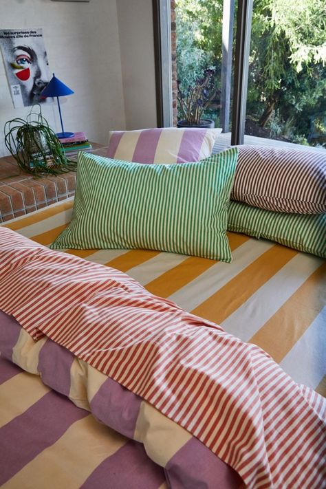 Color your dreams with these sheets Dreamy bedding | Colorful sheets | Bedding ideas | Vibrant linens | Cozy bedroom | Home decor | Rainbow bedding | Colorful dreams | Bedding inspiration | Bedroom style Bedroom makeover | Bed linens | Colorful home | Stylish bedding | Sleep in style | Interior design | Cozy home | Bedroom decor | Sheet sets | Bright and vibrant | Home styling ideas | Photo: sageandclare.com