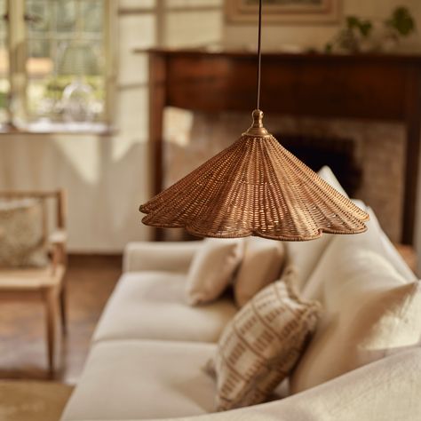 Inspired by the silhouettes of shells, this scallop-edged pendant showcases the natural beauty of handwoven rattan. Suspended from an understated brown flex, its sculptural shade with large opal globe cover softly diffuses the light. Hang one over the dining table or use two or three over your kitchen island to layer texture into your home. Rattan Pendants Over Island, Over The Table Lighting, Pendant Lights Over Dining Table, Mallorca Villa, Wine Rack Sideboard, Case Study Design, Hallway Coat Rack, Carver Chair, Kitchen Design Color