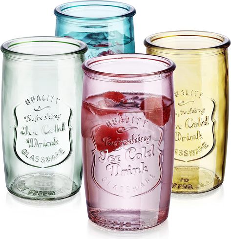 Durable and reliable water glasses set made from high-quality glass. Retro-style design with embossed patterns for added style. Set includes 4 highball glasses in assorted colors. Suitable for a variety of cold beverages. Hand decorated by skilled artisans. Hand wash only for preservation. #affiliate Cute Wine Glasses, Colored Drinking Glasses, Drinking Glasses Set, Vintage Drinking Glasses, Glassware Drinking, Ice Cold Drink, Colored Glassware, Kitchen Dining Table, Highball Glasses