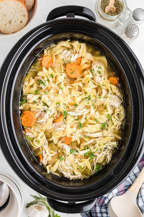 Chicken noodle soup in crock pot. Chicken For Chicken Noodle Soup, Crockpot Chicken Noodle Soup Recipes, Slow Cooker Chicken Noodle, Slow Cooker Chicken Noodle Soup, Chicken Soup Crockpot, Seasoning Chicken, Crockpot Chicken And Noodles, Chicken Noodle Soup Crock Pot, Chicken Noodle Soup Easy