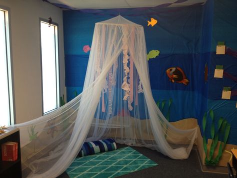 Jellyfish reading nook in my classroom Jellyfish Classroom Decor, Under The Sea Reading Corner, Ocean Reading Corner, Communication Friendly Spaces, Jellyfish Theme, Under The Sea Classroom, Ocean Reading, Book Nook Kids, Reading Areas