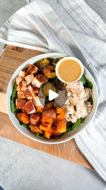 Claire Hodgins on Instagram: "MAPLE DIJON CHICKEN BOWLS 🥗🍗🍠  This is such an easy and DELICIOUS dinner to make this fall! It’s packed with protein, healthy veggies and fiber, and all of the flavors are so delicious together! The leftovers are also perfect for a healthy lunch the next day! 🙌  This recipe makes 4 servings! ~500 calories, 45g protein, 60g carbs, 6g fat each   Ingredients:  - 1 cup rice  - 2 cups water  - 2 medium sweet potatoes  - 2 cups brussel sprouts  - 1.5 lb chicken breast  - 1 tsp garlic powder - 1 tsp onion powder - 1 tsp paprika  - 2 tsp brown sugar - 1/4 tsp red pepper flakes  - 1 tsp salt  - Olive oil spray  - 4 cups arugula   Maple Dijon Dressing:  - 1/4 cup dijon mustard - 2 tbsp maple syrup  - 2 tbsp apple cider vinegar - 1/2 tsp garlic powder - Salt + pepper Claire Hodgins, Maple Dijon Dressing, Maple Dijon Chicken, Bowl Meals, Dijon Dressing, Chow Mein Recipe, Dijon Chicken, Chicken Bowls, Olive Oil Spray