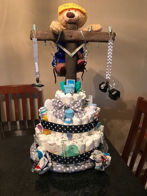 Lineman Diaper Cake Lineman Theme Party, Lineman Graduation Party, Lineman Gender Reveal Ideas, Lineman Nursery, Lineman Baby Announcement, Lineman Cake, Newborn Lineman Photography, Baby Peacock, Diaper Cake Castle