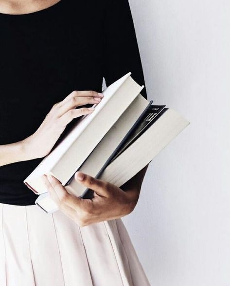 A Woman, Books, Black