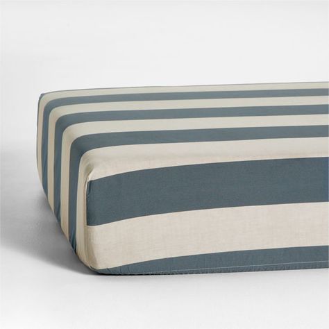 Give your nursery some vacay vibes with the bold, cabana-style stripes of our Riviera Crib Fitted Sheet. The organic cotton chambray with slate blue stripes offers a subtly textured, irresistibly soft feel that's still light and breathable. For a playful nursery look, pair the sheet with our matching changing pad cover.   • 100% organic cotton chambray, grown without chemicals or pesticides  • Passes OEKO-TEXr STANDARD 100 textile safety tests  • Elastic band keeps sheet in place  • This item ca Americana Nursery, Blue Nursery Boy, Tree Interior, Crib Fitted Sheet, Crib Bedding Boy, Modern Crib, Baby Boy Cribs, Baby Sheets, Vacay Vibes