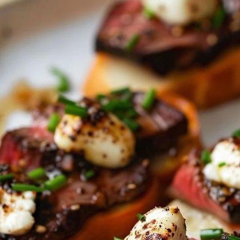 Marcelo Mintz on Instagram: "Just whipped up these luxurious Burrata and Hanger Steak Crostini for dinner tonight! 🍴🧀 Perfect blend of creamy and savory.
Burrata and Hanger Steak Crostini
Ingredients:
1 pound hanger steak, or any other steak such as flank, filet, ribeye
kosher salt and freshly ground black pepper
1 tablespoon mushroom powder, optional
1 sourdough baguette, sliced in 1-inch pieces
1 tablespoon neutral oil, such as canola, avocado, vegetable oil
2 large garlic cloves
8 ounce burrata
top with finely chopped chives and a drizzle of balsamic vinegar, optional
Directions:
Preheat your oven to 350 degrees F (175 degrees C).
Season the steak with salt, pepper, and mushroom powder.
Slice the baguette into 1-inch pieces and toast in the oven for 6-8 minutes.
Heat oil in a cast iro Burrata Crostini, Steak Crostini, Steak Appetizers, Sourdough Baguette, Hanger Steak, Toast In The Oven, Toasted Bread, Flaky Salt, Mushroom Powder