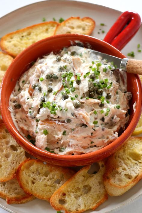 Smoked Trout Dip is the party dip that will have everyone asking for the recipe. It’s salty, smoky, briny and creamy. Everything that makes up the perfect dip. #appetizer #partyfood #easyrecipe #trout Mushroom Pinwheels, Tree Decorating Party, Fish Dip Recipe, Smoked Trout Dip, Smoked Fish Dip, Toasted Crostini, Homemade Appetizer, Trout Recipes, Party Dip