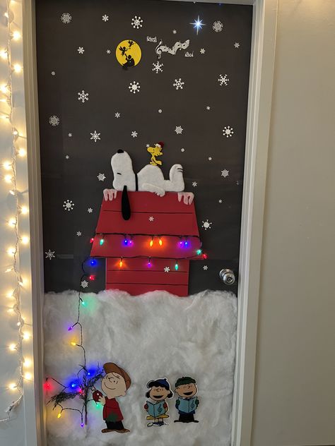 Door Decor Christmas Classroom, Christmas Decor Door Ideas School, Charlie Brown Christmas Door Decor, Peanuts Door Decoration Christmas, Christmas School Hallway Ideas, School Christmas Door Decorating Contest, Christmas Theme Door Decorations, Penguin Classroom Door Ideas, Christmas Door Decor Ideas For Work