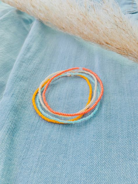 This minimalist bracelet set is so dainty and would make a nice gift. Stack these together, with other bracelets, or wear them by themselves! Wear these bracelets at the beach, in the mountains, at home, and wherever else you go! They are perfect for everyday wear! ∙ ∙ ∙ ∙ ∙ ∙ ∙ ∙ ∙ ∙ ∙ ∙ ◆ MATERIALS ◆ * High Quality Beading Elastic * Seed Beads of Various Colors ∙ ∙ ∙ ∙ ∙ ∙ ∙ ∙ ∙ ∙ ∙ ∙ ◆ SIZES ◆ This bracelet set is made to order so you can order it in whatever size you need. If you need a cust Beach Seed Bead Bracelets, Beach Themed Beaded Bracelets, Seed Bead Color Combinations, Seed Bead Bracelets Ideas, Glass Seed Bead Bracelet, Beachy Bracelets, Small Bead Bracelet, Beach Bracelet, Friendship Bracelets Tutorial