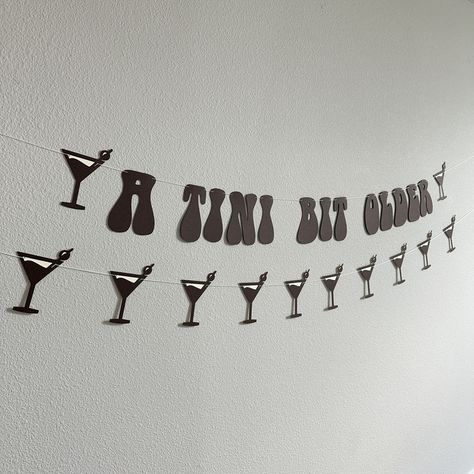 ☕🍸 Embrace the fun of getting "A Tini Bit Older" with our espresso martini-themed banner! Perfect for adding a sophisticated yet playful touch to any birthday celebration. Let the stylish design and witty message bring a dash of humor and a lot of flavor to the party. Cheers to another year, and a delicious one at that! 🎉✨ #ATiniBitOlder #BirthdayBanner #EspressoMartini #PartyDecor Espresso Martini 30th Birthday, A Tiny Bit Older Espresso, Tini Bit Older Espresso, 27th Birthday Party Ideas, Espresso Birthday Theme, Espresso Martini Party Decor, Tini Bit Older Party Decor, Expresso Martini Party, A Tiny Bit Older Party Theme Espresso