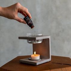 Saje Natural Wellness on Instagram: “Meet the Elements Studio diffuser – a limited-edition, heat-powered diffuser. ⁠⠀ ⁠⠀ Cement your wellness with this sleek diffuser, perfect…” Rocks For Garden, Cement Candle, Candle Crafts Diy, Cement Art, Concrete Diy Projects, Concrete Furniture, Concrete Crafts, Concrete Projects, Cement Crafts