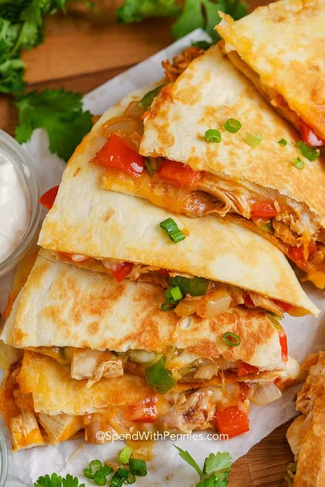 This easy chicken quesadilla recipe is ready in 30 mins and makes a great dinner or snack! This easy recipe is made with shredded chicken and cheese and whether baked or grilled turns out perfectly cheesy on the inside with a crisp and delicious exterior. #spendwithpennies #chickenquesadilla #athome #easyrecipe #Mexican #grilled #baked #shreddedchicken Chicken For Quesadillas, Easy Chicken Quesadilla Recipe, Homemade Velveeta, Panini Recipes Chicken, Quesadilla Recipes Easy, Canned Jalapenos, Hungarian Goulash, Braised Chicken Breast, Slow Cooker Shredded Chicken