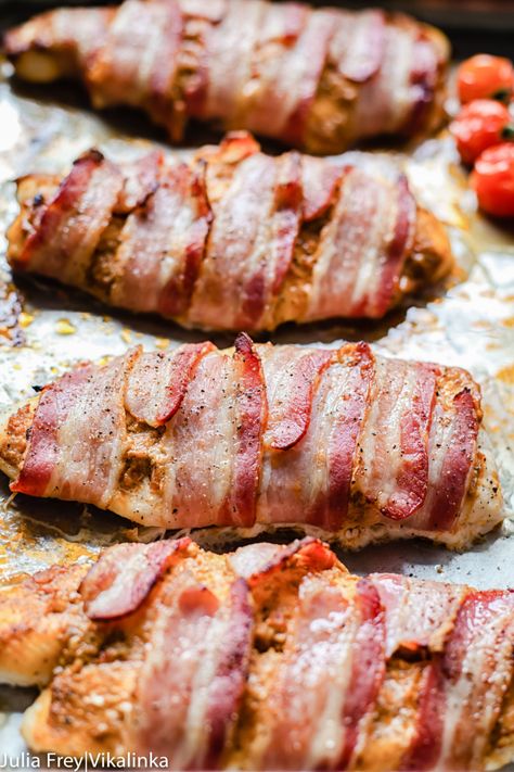 This bacon wrapped fish with sun-dried tomato pesto is the quickest dinner to make and requires only 4 ingredients! Bacon Wrapped Salmon, Baked Fish Recipe, Fish Supper, Oven Baked Bacon, Fish Recipes Baked, Seafood Entrees, Wrapped In Bacon, Best Seafood Recipes, Baked Bacon