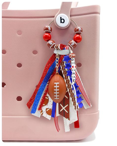 PRICES MAY VARY. 🏈 Elevate Your Style with Gridiron Glamour: Our Bogg Bag accessory combines a trendy tassel crafted from different ribbons, a football charm, and eye-catching wooden beads. This handmade bogg bag charm instantly adds a touch of gridiron glamour to any bag, making heads turn wherever you go. 💯 Premium Quality Craftsmanship: Our handmade Bogg Bag Charm is meticulously crafted using high-quality materials and detailed workmanship. From the intricately designed tassel to the durab Fabric Bag Charms Diy, How To Make Bogg Bag Charms, Bogg Bag Ribbon Tassel Diy, Bogg Bag Charms, Bogg Bag Accessories, Tote Bag Accessories, Swimming Team, Football Crafts, Bag Accessories Diy