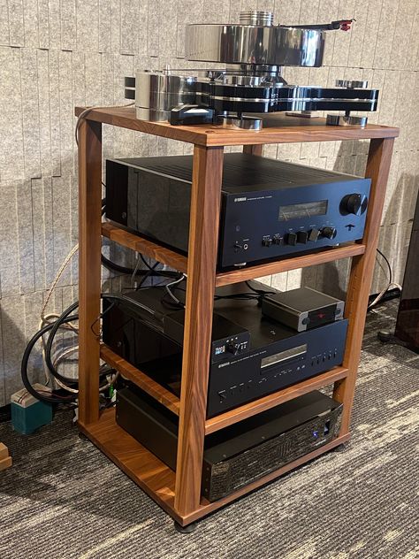 "Walnut Audio Rack with adjustable shelving and self leveling feet. Now Shipping Worldwide. Contact for more information Audio Racks are handmade from premium-grade kiln dried solid wood and finished with a hard wax oil. Racks are perfect for showcasing your favourite Hifi audio components.  All Racks are made from hand selected pieces of hardwood. Each Rack is unique and the wood will vary in it's character and figure. Racks can have knots which will be filled with a black or clear resin to rei Turntable Shelf, Vinyl Record Storage Shelf, Audio Racks, Computer Rack, Vintage Stereo Console, Friends Room, Hifi Room, Audiophile Room, Hifi Stand