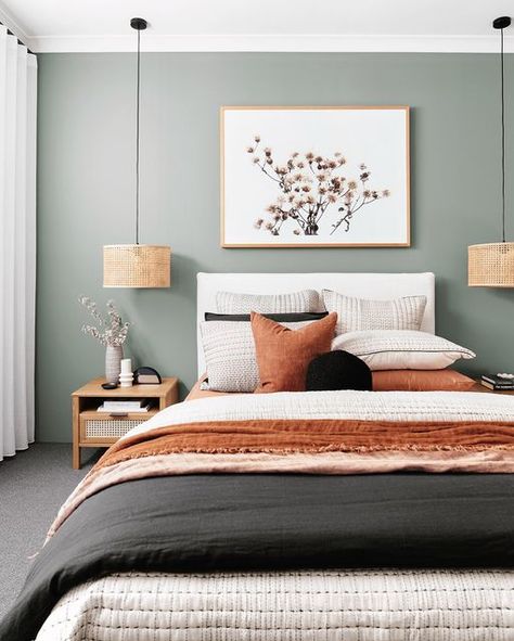 Tarina Wood on Instagram: "Soothing hues of the outback 🌿🍂🌾🪵🏔️

In the Pembrooke, both the master and guest bedrooms showcase lovely accents of sage and spiced tones. The master bedroom achieves this with a striking (yet subtle) feature wall complemented by neutral bedding and art, while the guest bedroom utilises linen and artwork to introduce these cosy colours. It’s an effective and simple way to make two different areas feel cohesive, without being repetitive 🪴✨

You can visit the Pembrooke in person at @homebuyerswa 15 Barracoota Loop, Lakelands (open Wed, Sat and Sunday.) 🏡📍

Poll: Are you drawn to sage and green accents in interior settings?" Australian Bedroom, Green Accent Walls, Feature Wall Bedroom, Neutral Bedding, Cosy Bedroom, Bedroom Wall Colors, Accent Wall Bedroom, Neutral Bedroom, House Things