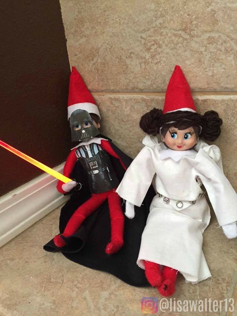 Elf on the Shelf Star Wars. Jingle was Darth Vader and Lashes was Princess Leia. They got SW candy canes, stockings, tickets to The Force Awakens in 3D. December 18, 2015 #elfontheshelf #jingleandlashes #starwars #elfontheshelfideas #elfideas #theforceawakens #lightsaber #darthvader #princessleia #walterboys Elf On The Shelf Ideas Star Wars, Star Wars Elf On The Shelf Ideas, Elf On The Shelf Star Wars, Elf 2023, Elf 2024, Library Shelf, Bad Elf, Elf Yourself, Awesome Elf On The Shelf Ideas