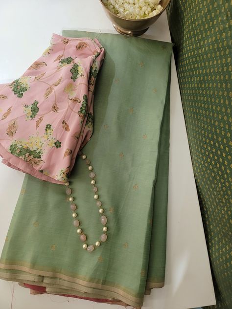 Cardamom green kancheepuram silk saree with zari buttis woven in pure zari on the body. The pallu and blouse is dusty pink with maple leaves printed all over. The saree is softened and drapes beautifully. Green Shade Saree, Contrast Colour For Pink, Green Combination Color, Green And Pink Saree, Isha Borah, Saree Aesthetics, Normal Saree, Sarees Ideas, Saree Combination